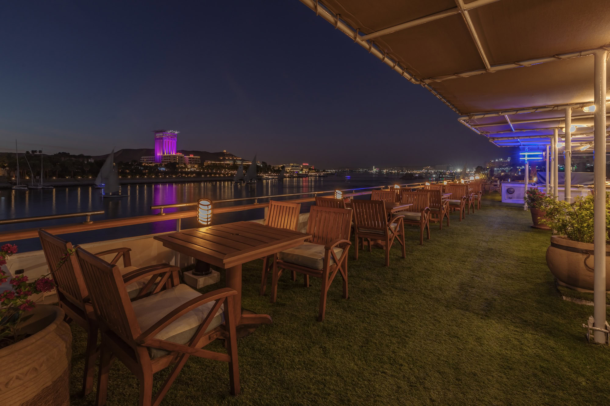 MS Salacia deck illuminated at night with soft lighting