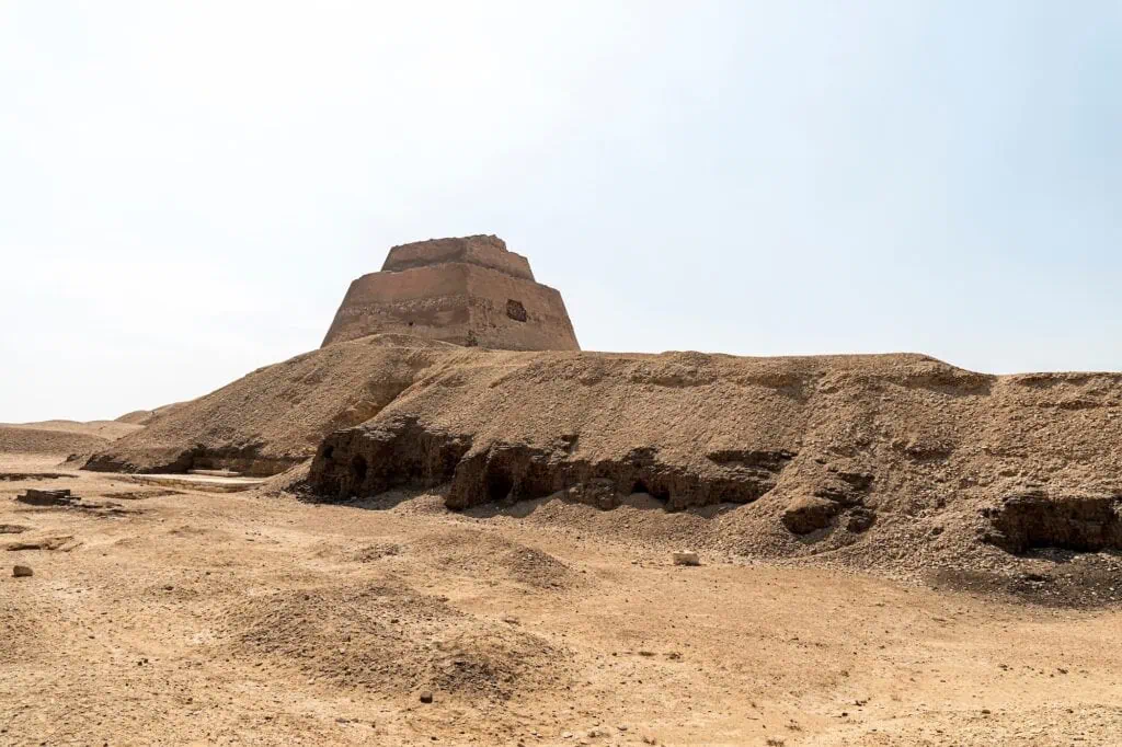 A rectangular flat-roofed mastaba built of mudbrick and stone standing near the pyramid structure on the desert edge, Mastaba Tomb, Meidum