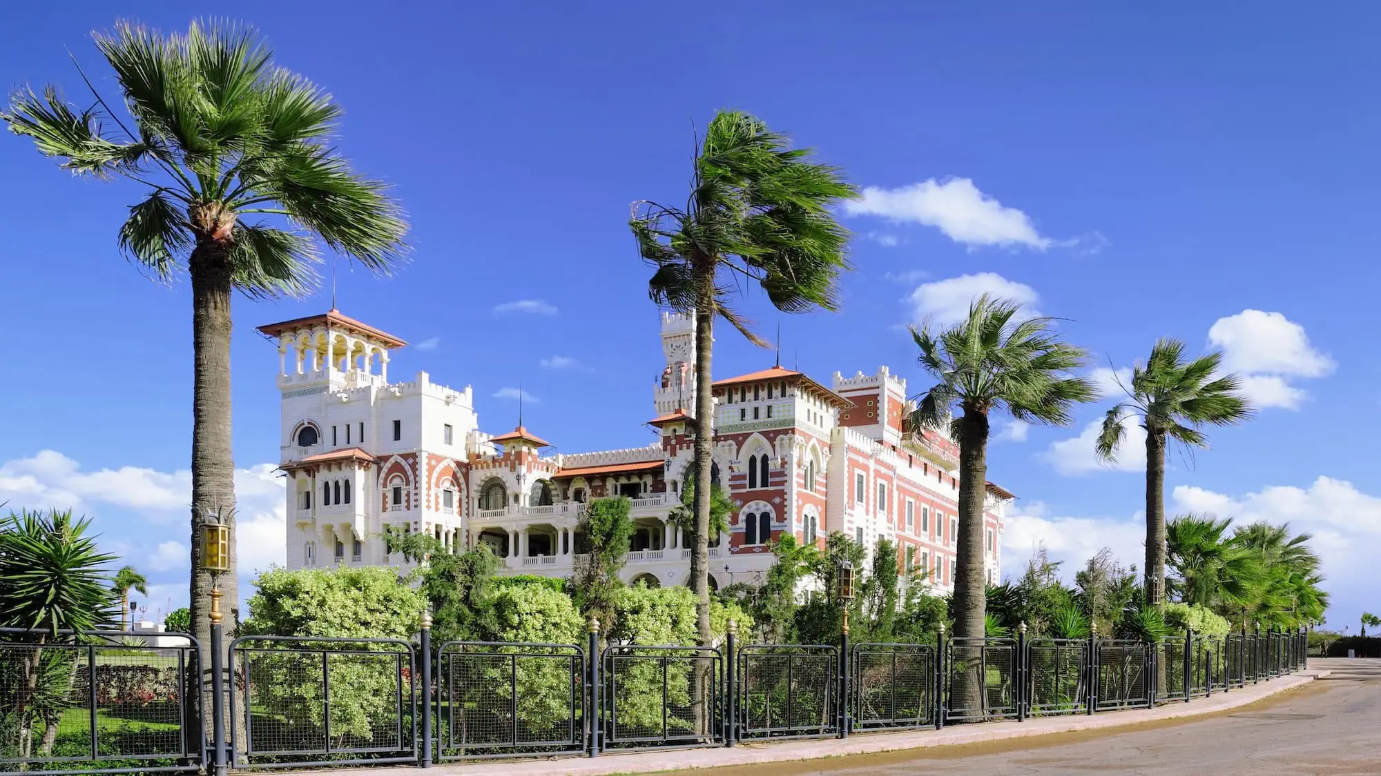 Serene Montaza Palace in Alexandria with palm trees and gardens