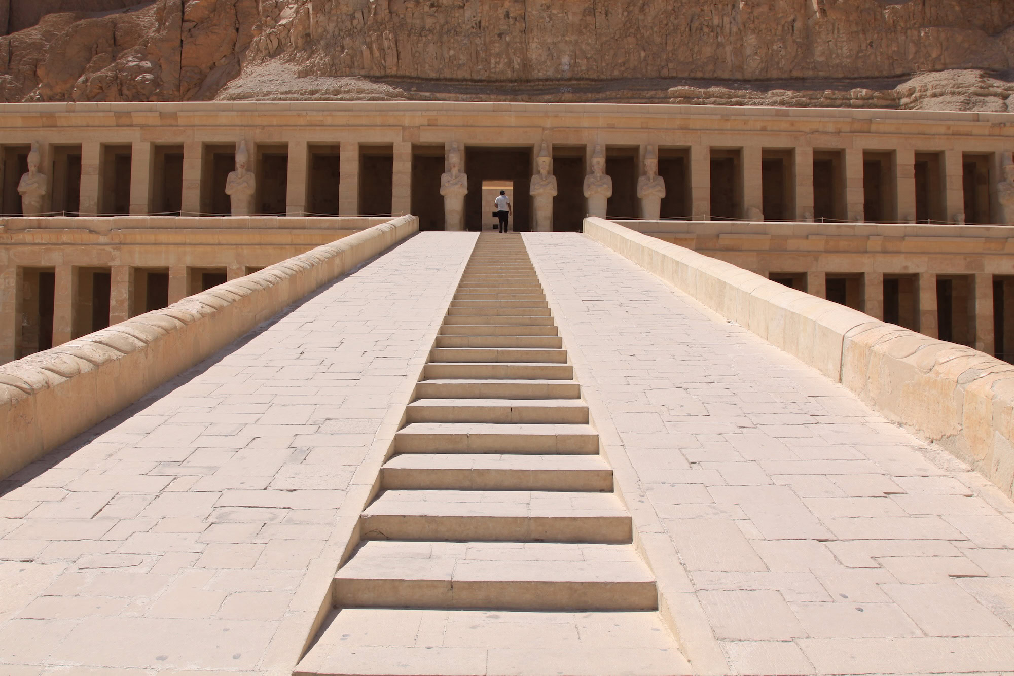 Hatshepsut Temple with its distinctive columns and terraced architecture against desert cliffs in Luxor
