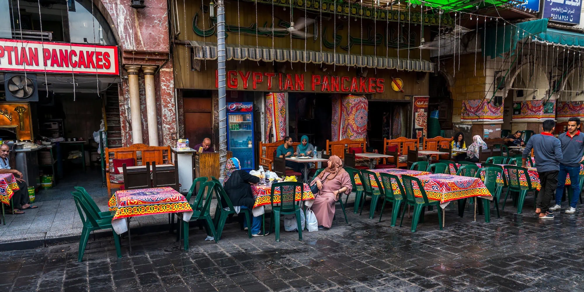 Traditional Egyptian restaurant with diners at tables
