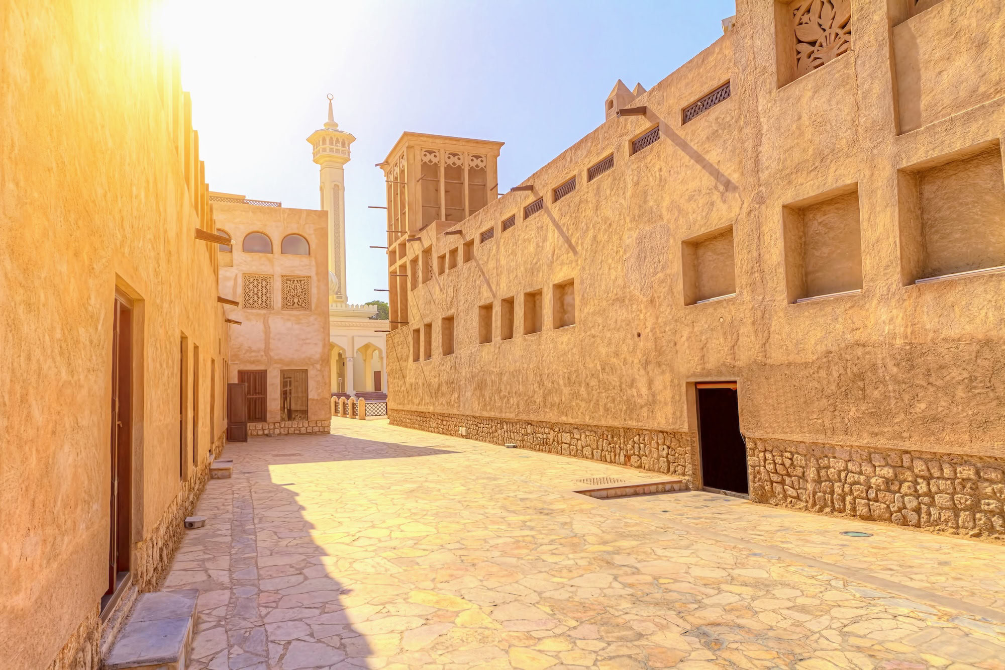 Traditional courtyard with wind tower and archways in Al Fahidi Historical Neighborhood, Dubai