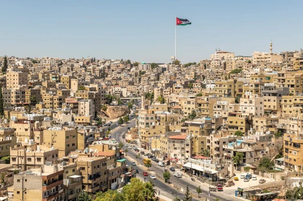 Panoramic view of densely built buildings spread across hills in Amman City, Amman