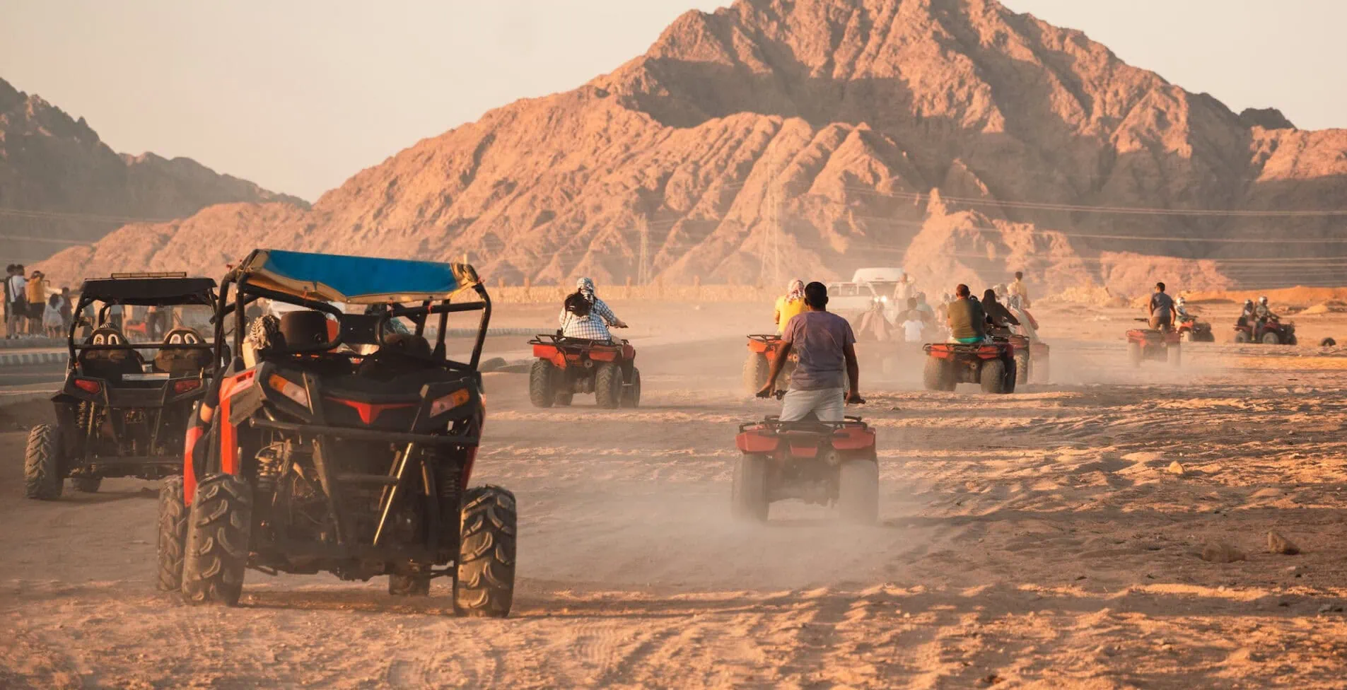 Quad bikes safari in the desert Egypt. Safari trip through egyptian desert driving ATV. 1905x976 crop 53 72