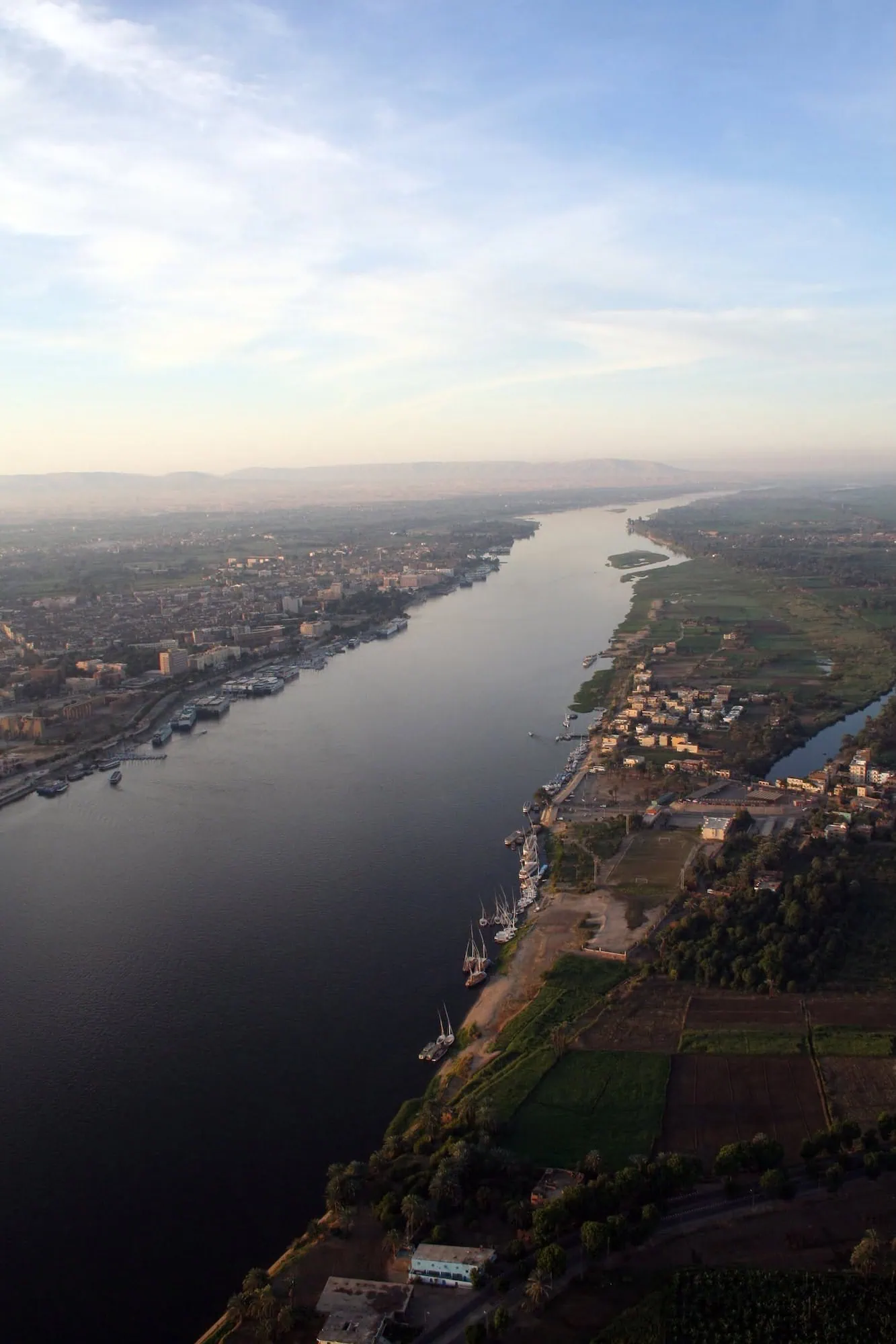 Aerial view of the Nile River showing clear skies and optimal travel conditions in Egypt