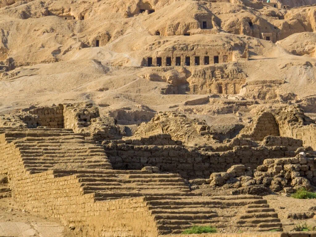 Rock-cut tomb entrances and mudbrick remains at the Valley of the Nobles, Luxor