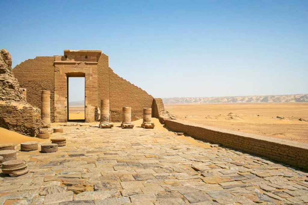 Ruins of the Temple of Dush and adjacent Roman fortress with surviving stone walls, Kharga