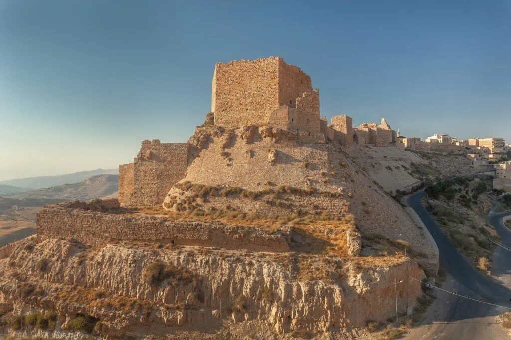 Stone ruins of Kerak Castle overlooking the surrounding valley on a hill, Al Karak