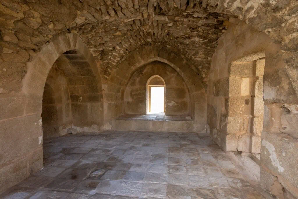 Interior stone halls and vaulted chambers of Montreal Crusader Castle in Shoubak