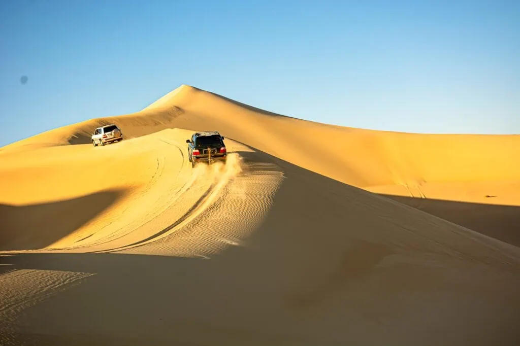 4x4 safari across Great Sand Sea dunes near Siwa Oasis