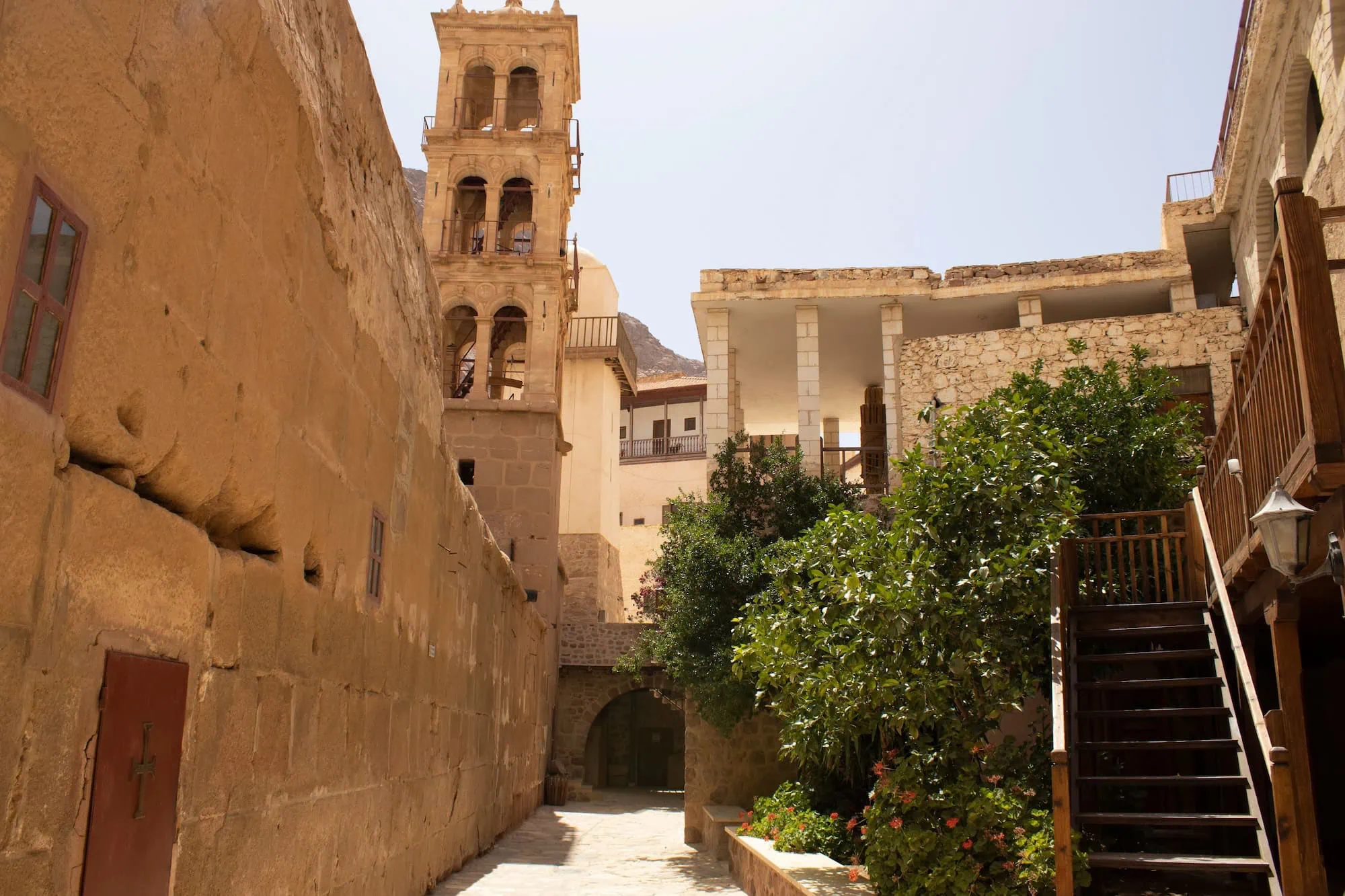 Saint Catherine's Monastery with bell tower and stone walls in Egypt