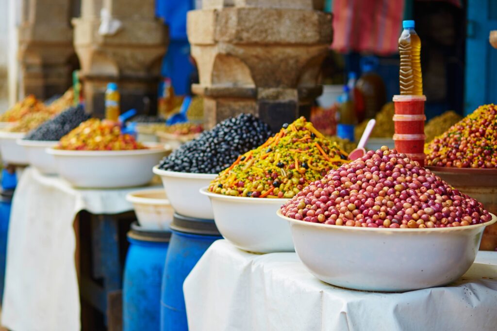 Selection of pickled olives on a traditional Moroccan market souk in Essaouira Morocco