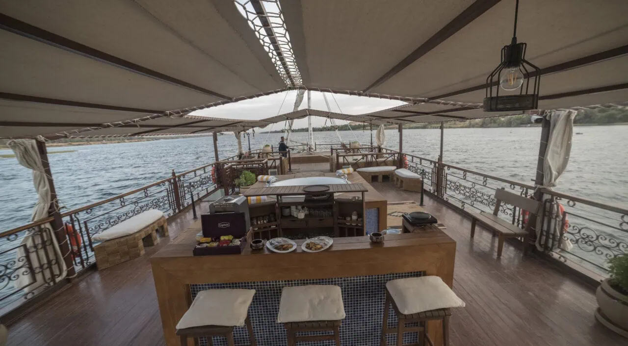 Deck with spa and shaded seating on Sonesta Amirat