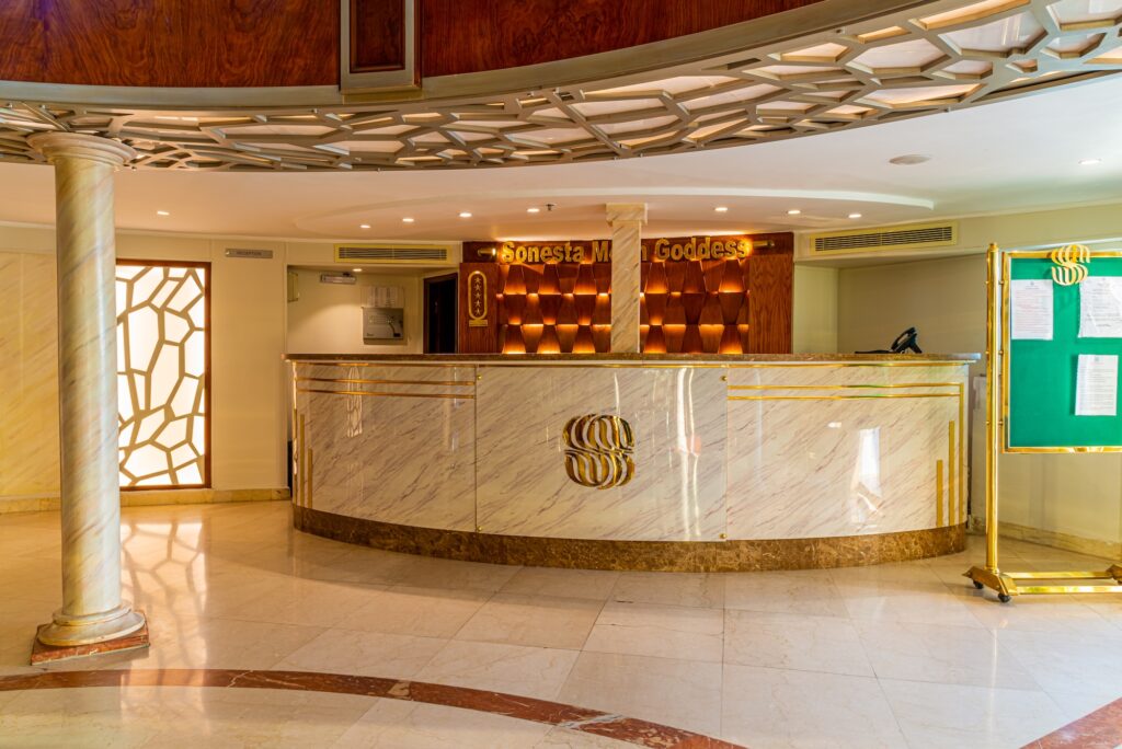 Reception area with front desk and seating aboard the Sonesta Moon Goddess Nile Cruise