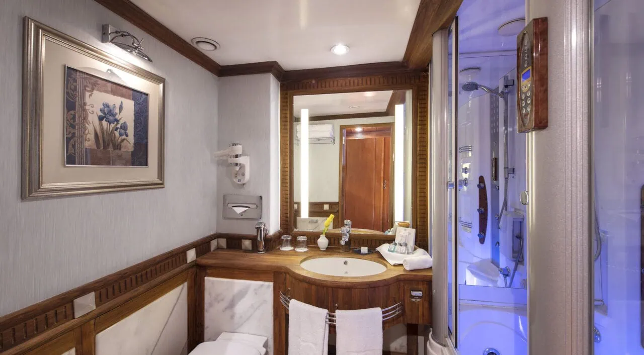 Luxury bathroom on Sonesta Saint George with marble finishes and elegant décor