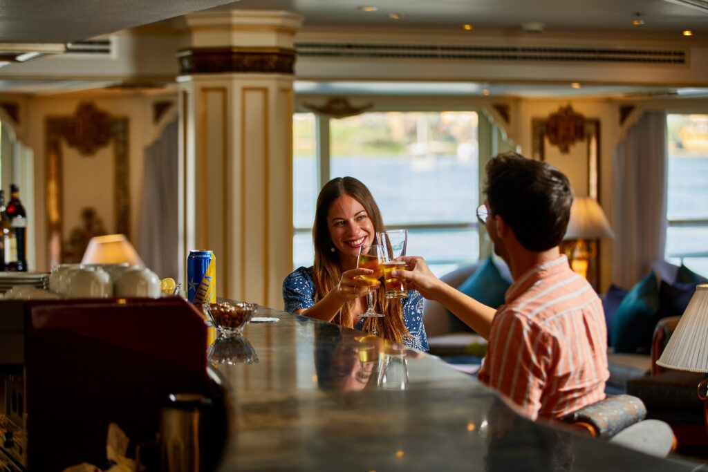 Indoor bar area at Sonesta St. George Hotel with elegant seating, counter, and soft interior lighting, Luxor