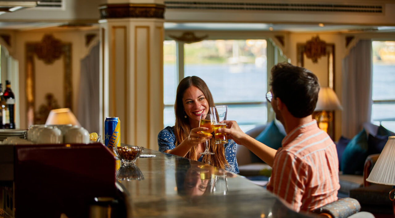 Indoor bar on Sonesta Saint George with elegant seating and soft lighting
