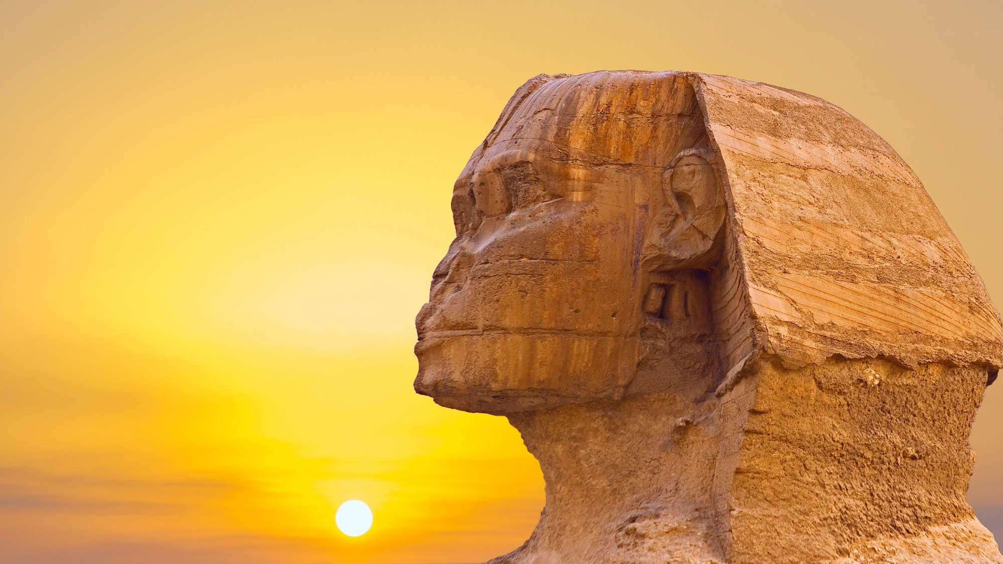 The Great Sphinx of Giza standing majestically in the desert as guardian of the pyramid complex