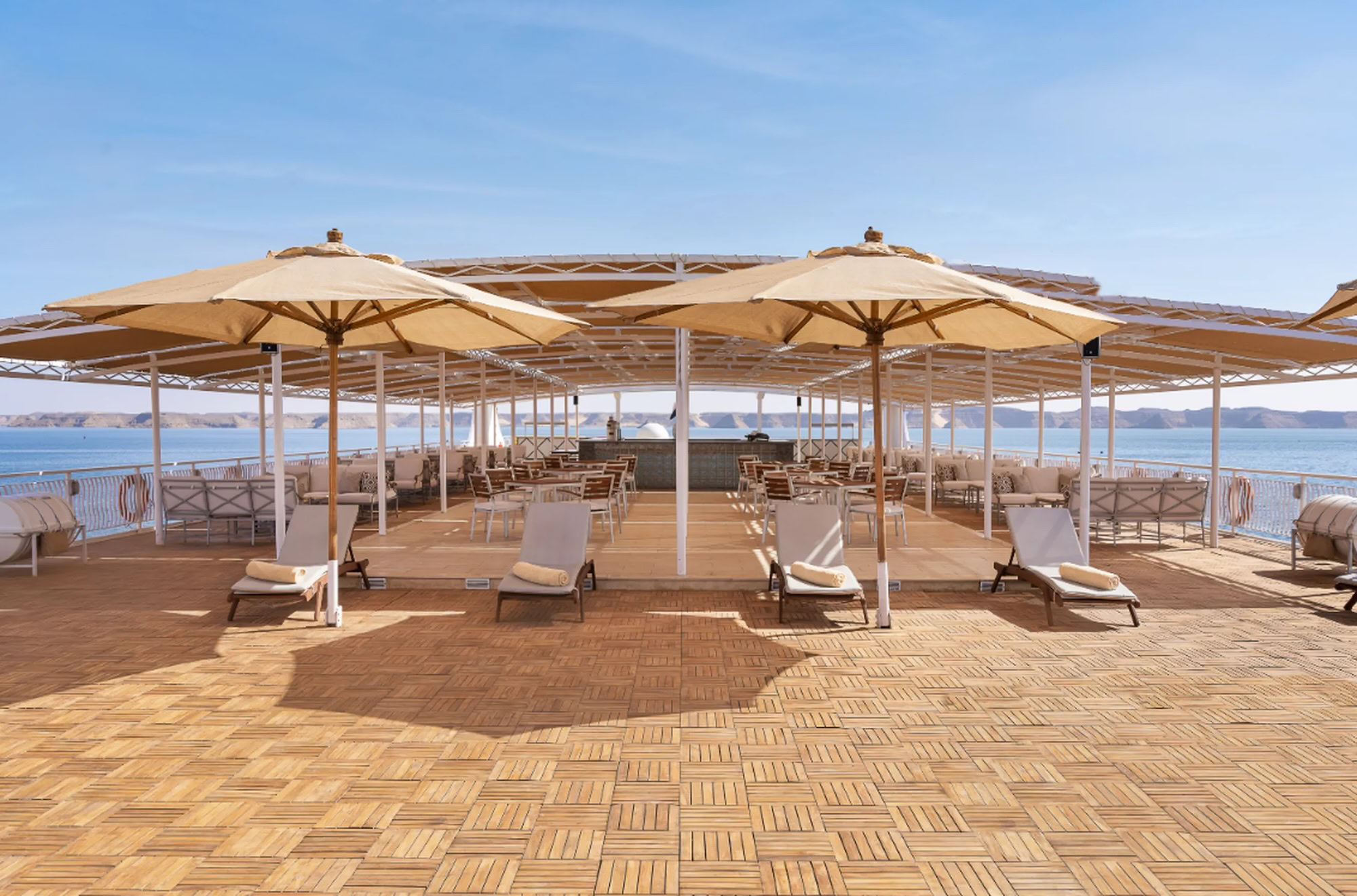 Sun deck on MS Steigenberger Omar El Khayam with loungers and umbrellas