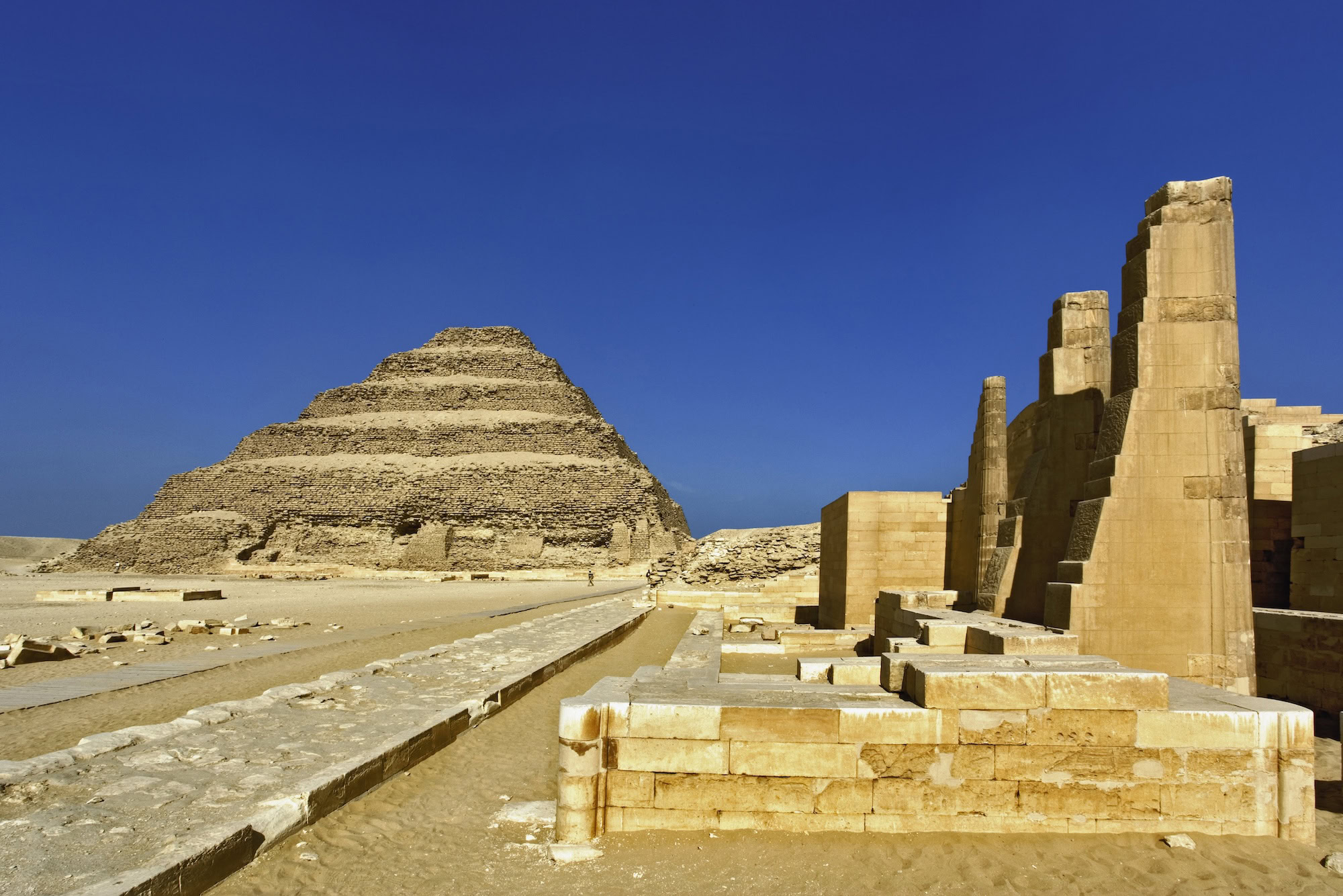 Step Pyramid of Djoser with ancient columns and temple ruins at Saqqara