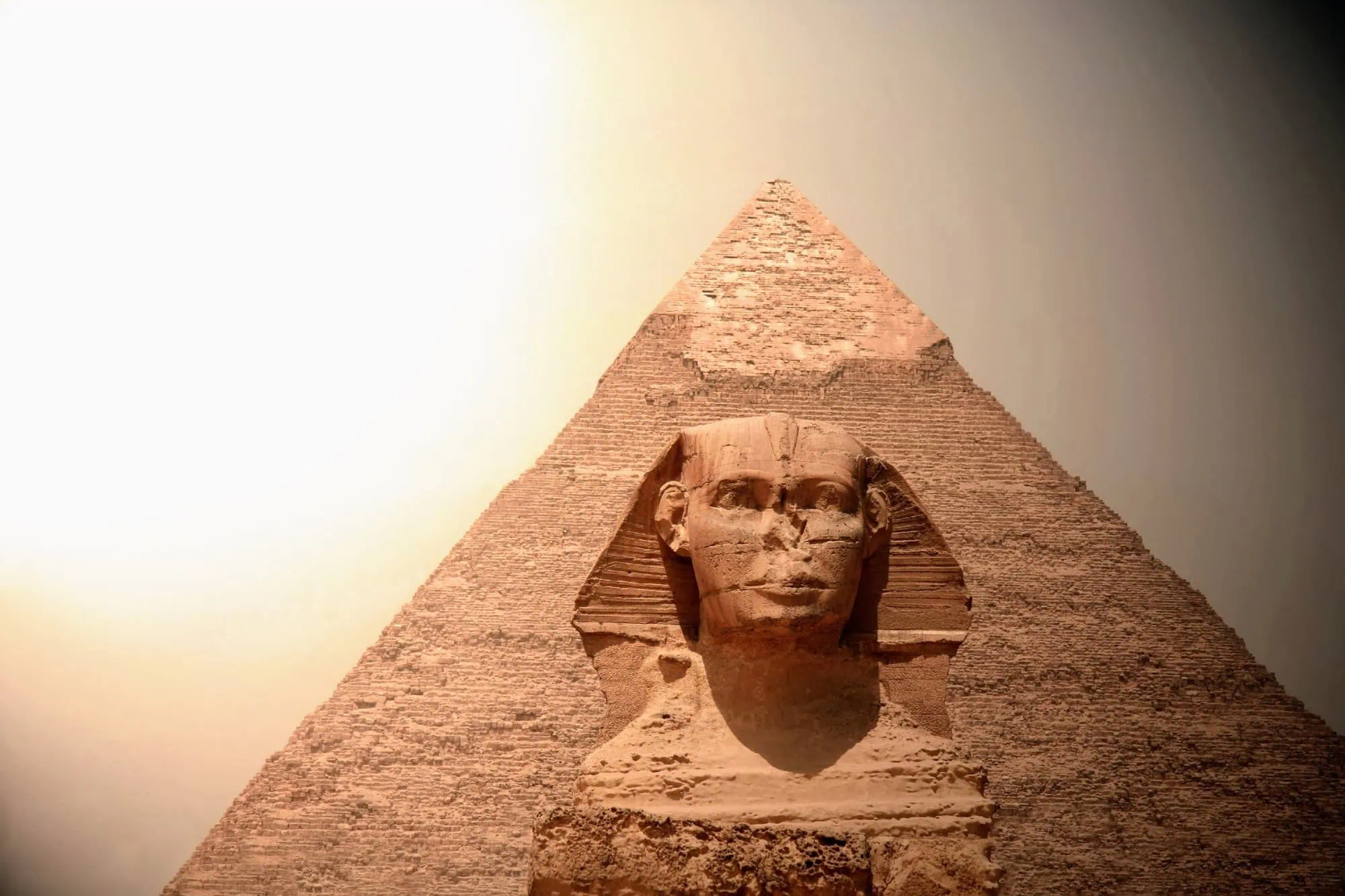 The Great Sphinx of Giza at sunrise with the pyramids behind it, the centrepiece of the Cairo days that open every Egypt tour, including the compact 8-day itinerary, before the flight south to Luxor.