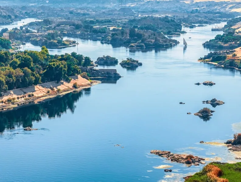 Sunset over the Nile River in the city of Aswan with sandy and deserted shores 792x600 crop 74 41
