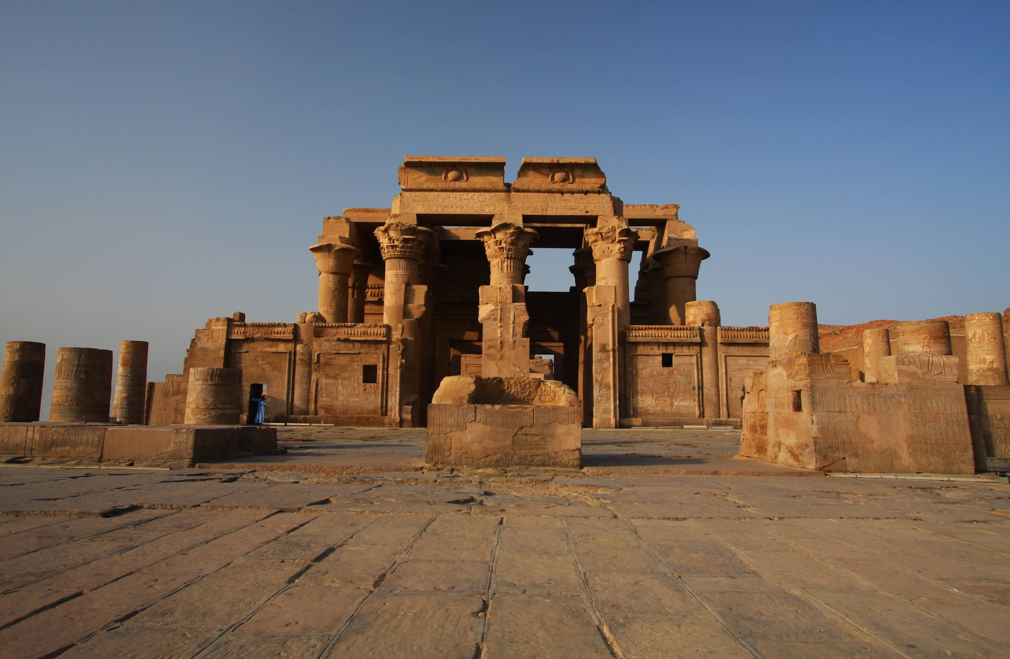 Ancient Kom Ombo Temple ruins with stone columns and hieroglyphic carvings in Egypt
