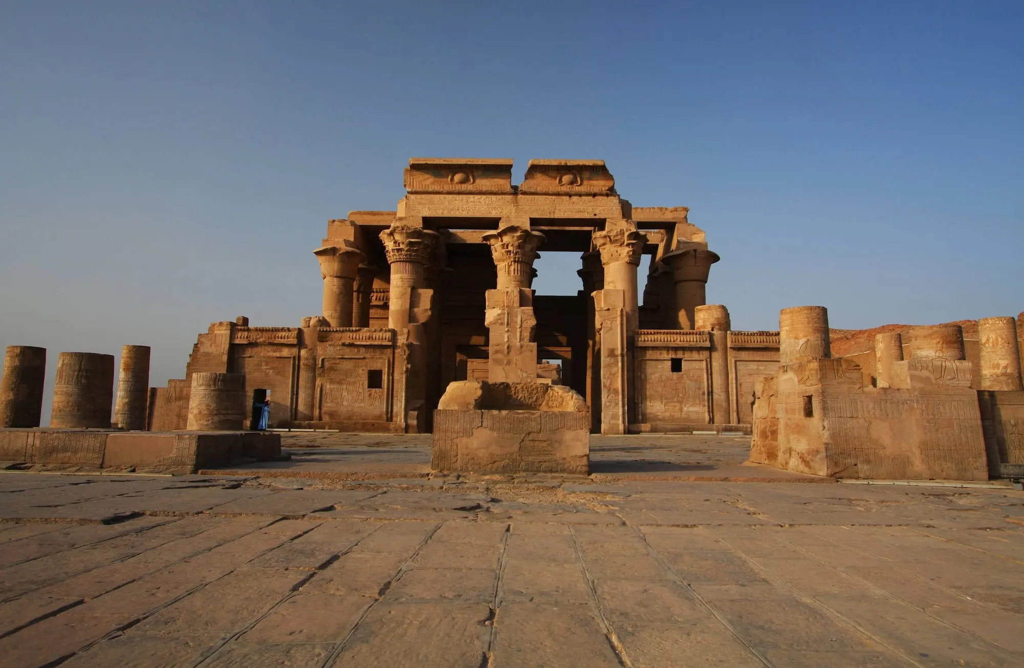 Ancient Kom Ombo Temple ruins with stone columns and hieroglyphic carvings in Egypt
