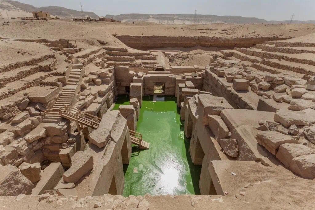 Temple of Osiris (Osirion) with massive granite blocks and a central water-filled chamber at Abydos