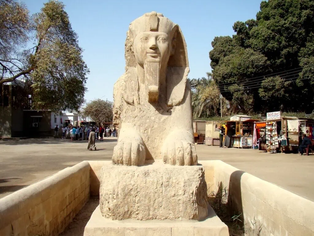 The alabaster sphinx statue with a human head and lion body displayed at the open-air archaeological site of Memphis, Memphis