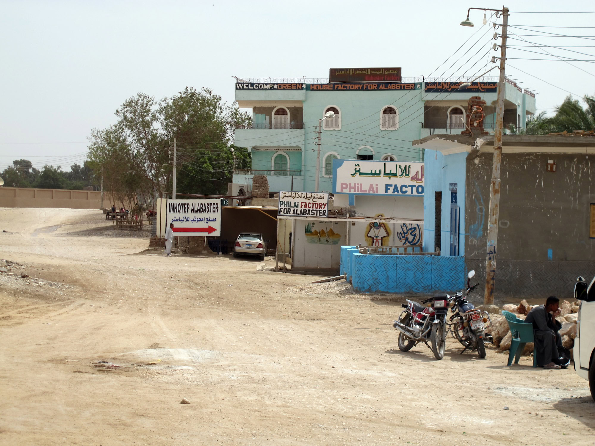 Alabaster factory district in Egypt with buildings and signage