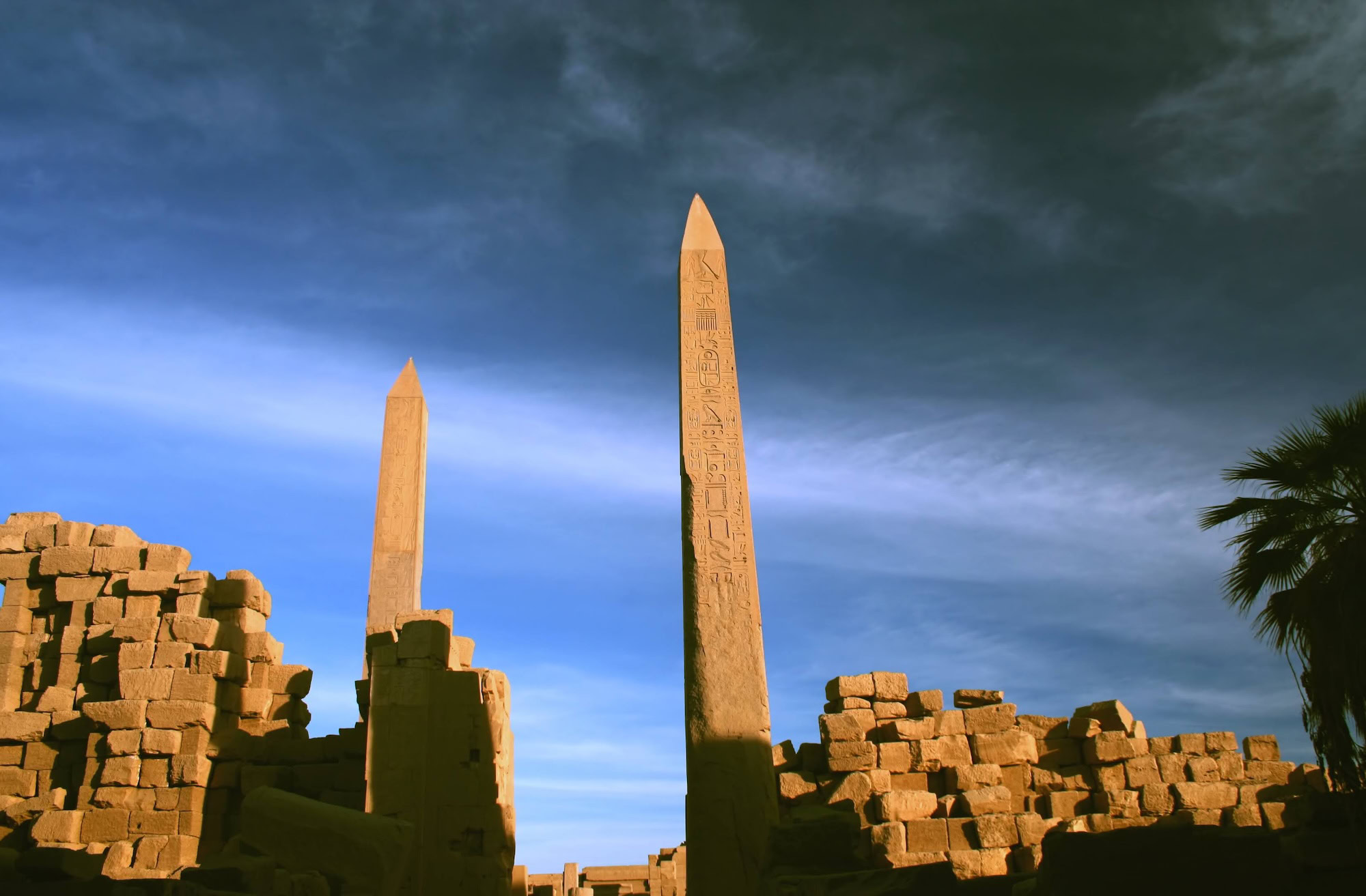 Ancient Egyptian obelisks and temple ruins at Karnak Complex