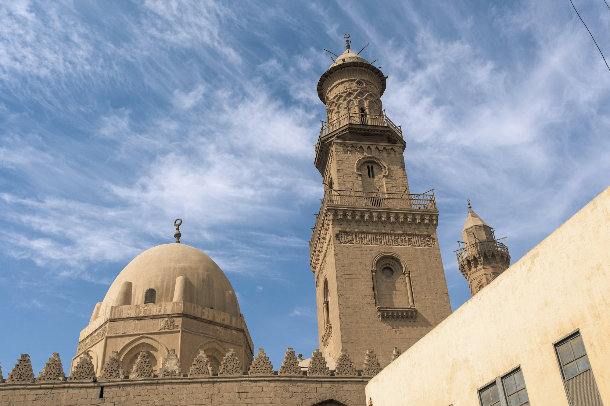 Ibn Tulun Mosque spiral minaret with dome and Islamic architectural details in Cairo