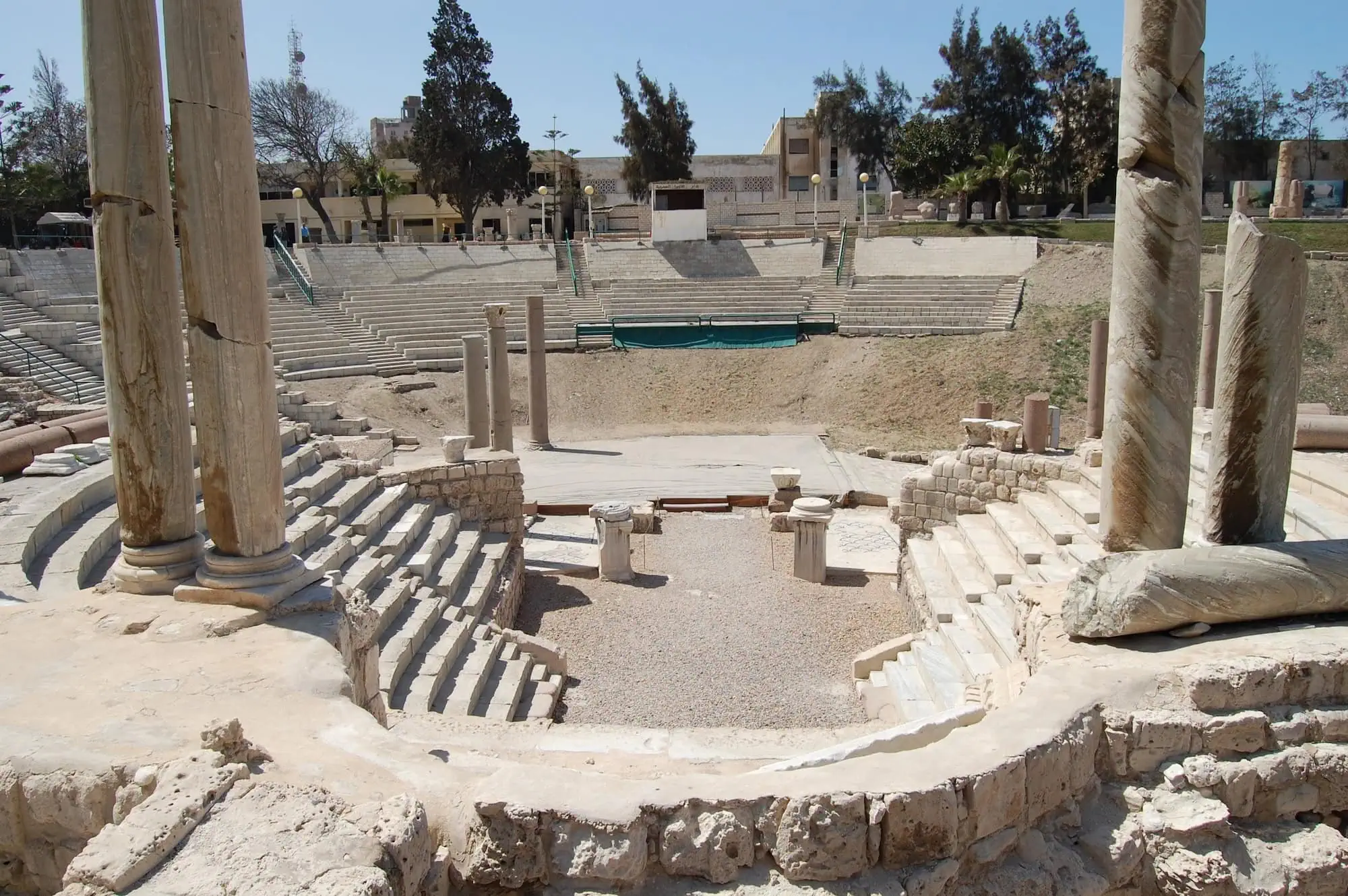Ancient Roman theater ruins in Alexandria showing stone seating tiers and marble columns
