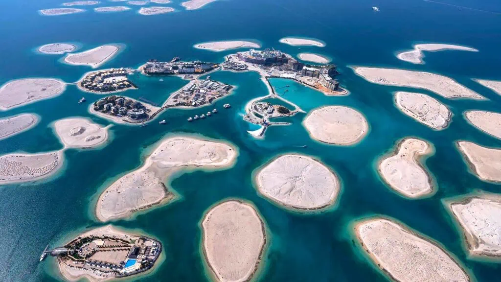 The World Islands artificial archipelago forming a map-like layout of small islands surrounded by sea in Dubai