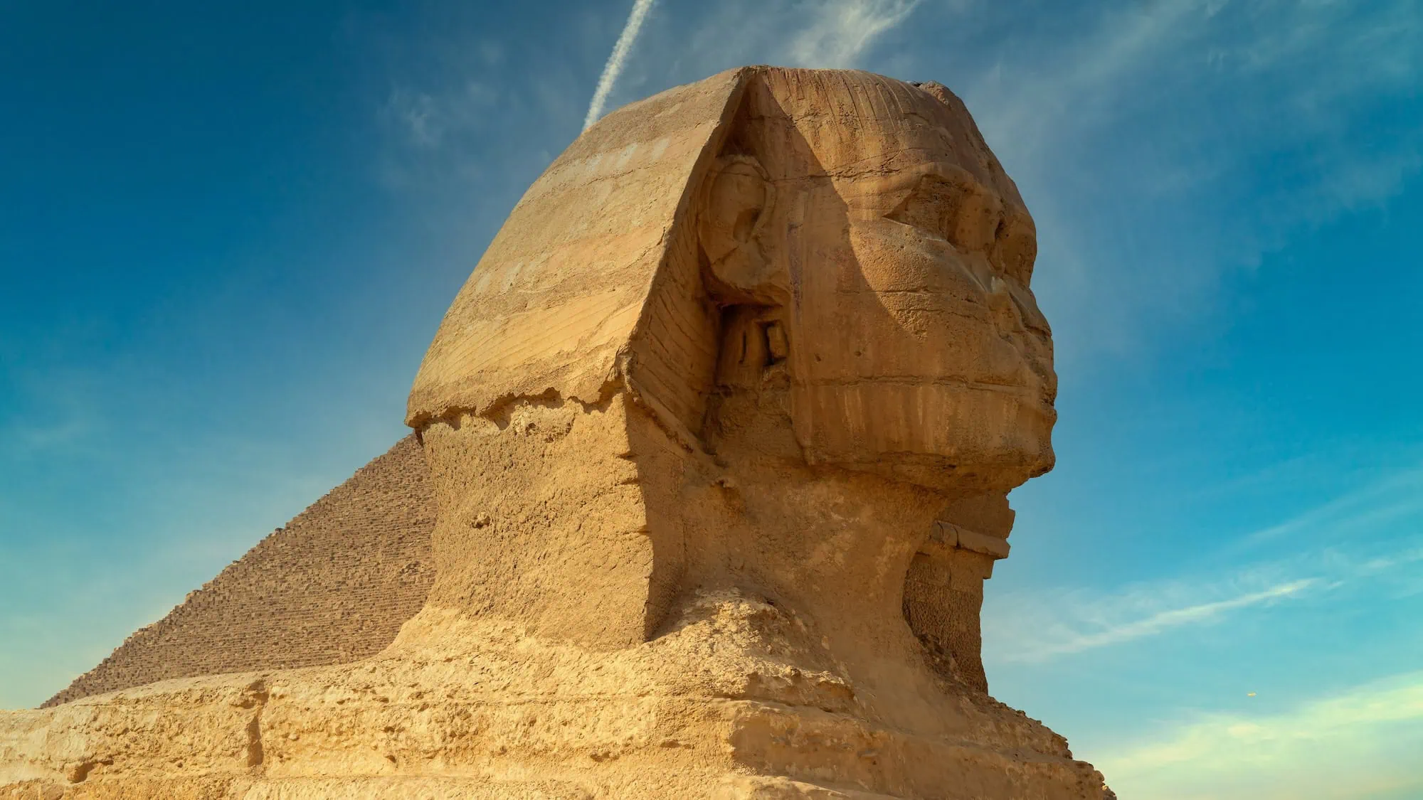 The Great Sphinx of Giza showing the ancient limestone monument with human head and lion body
