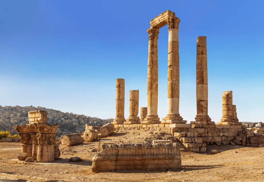 The ruins of the Temple of Hercules in Amman the ancient fortress on a background of the urban landscape Jordan
