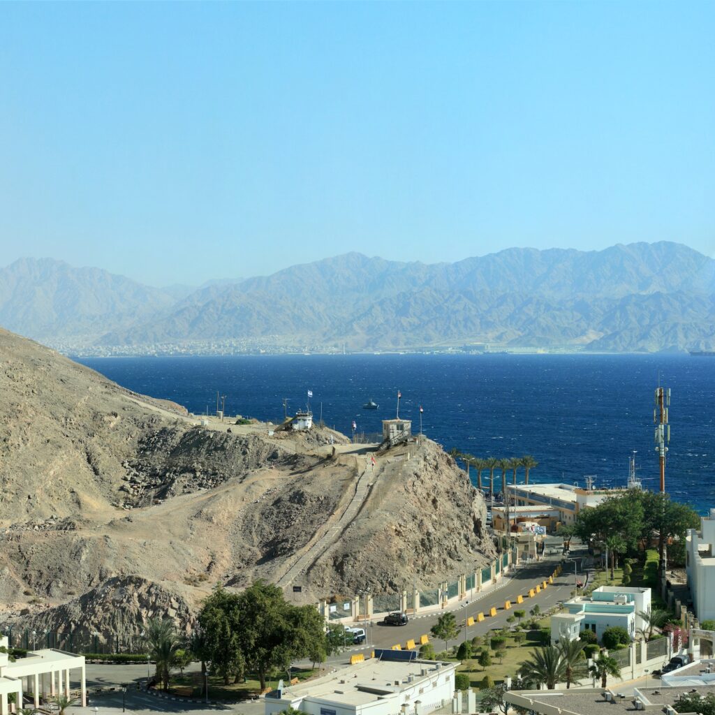 View across the Egyptian–Israeli border with the port area of Aqaba visible in the distance, Eilat