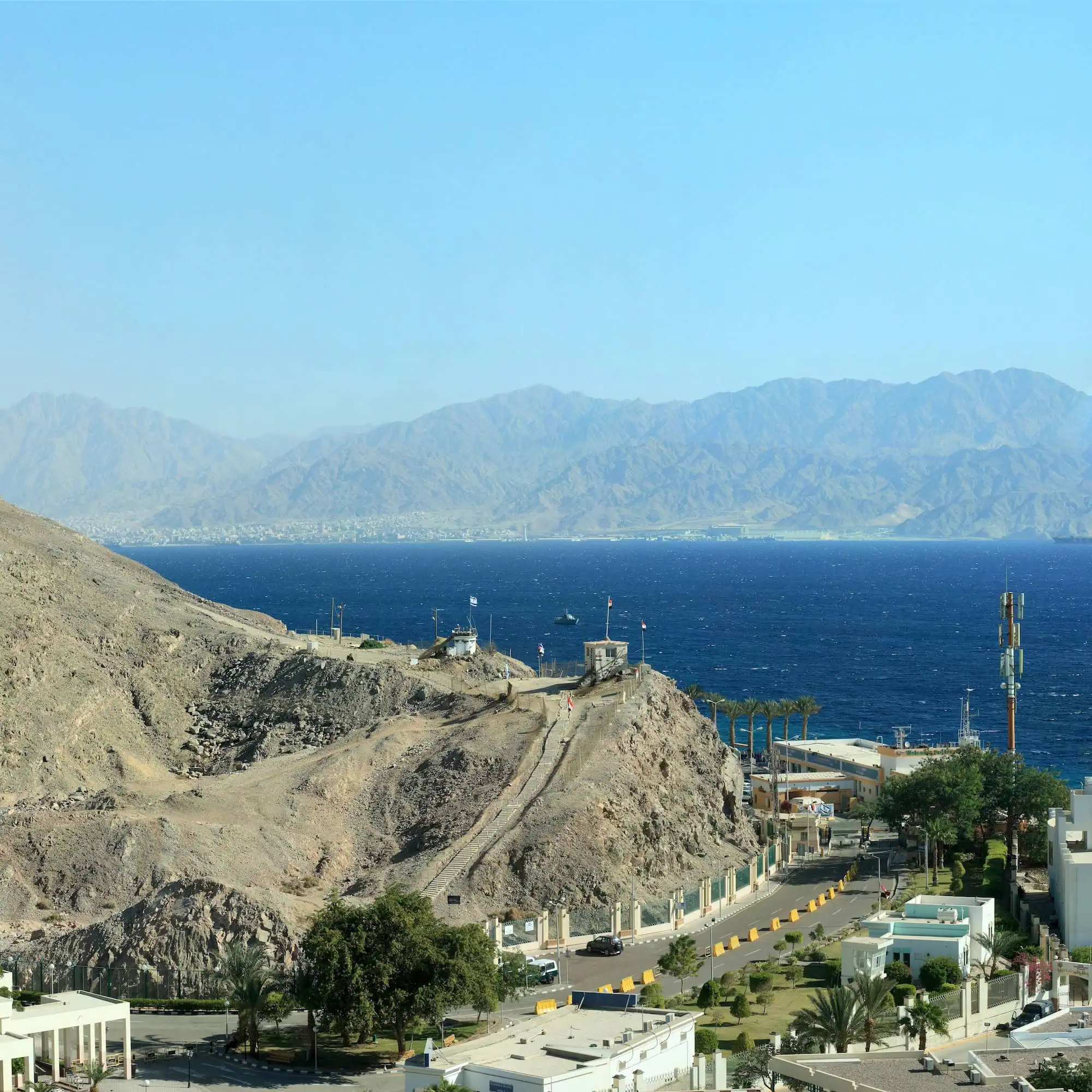 Border area view showing Egyptian-Israeli border near Aqaba with Red Sea and mountainous landscape
