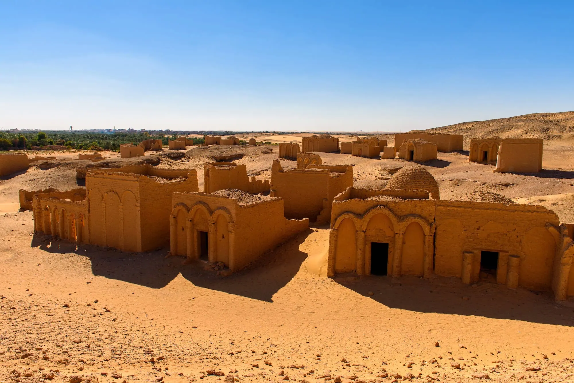 Ancient mud brick tombs and structures at Al Bagawat Cemetery archaeological site