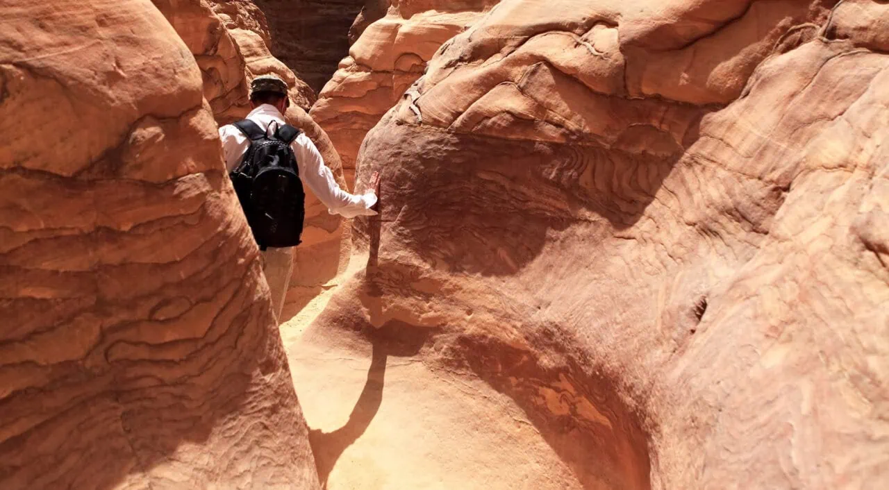 Tourist in the Colored Canyon, Mountains of Sinai