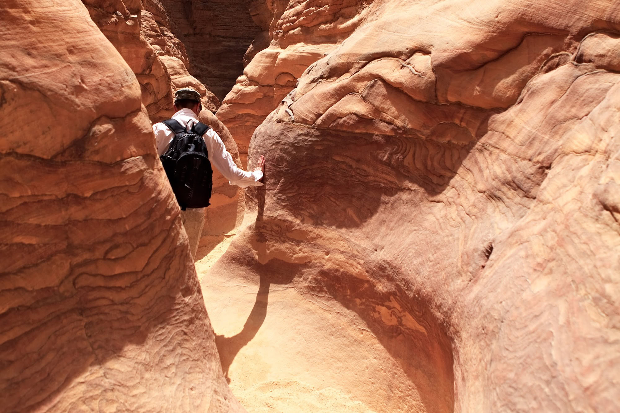 Tourist in the Colored Canyon, Mountains of Sinai