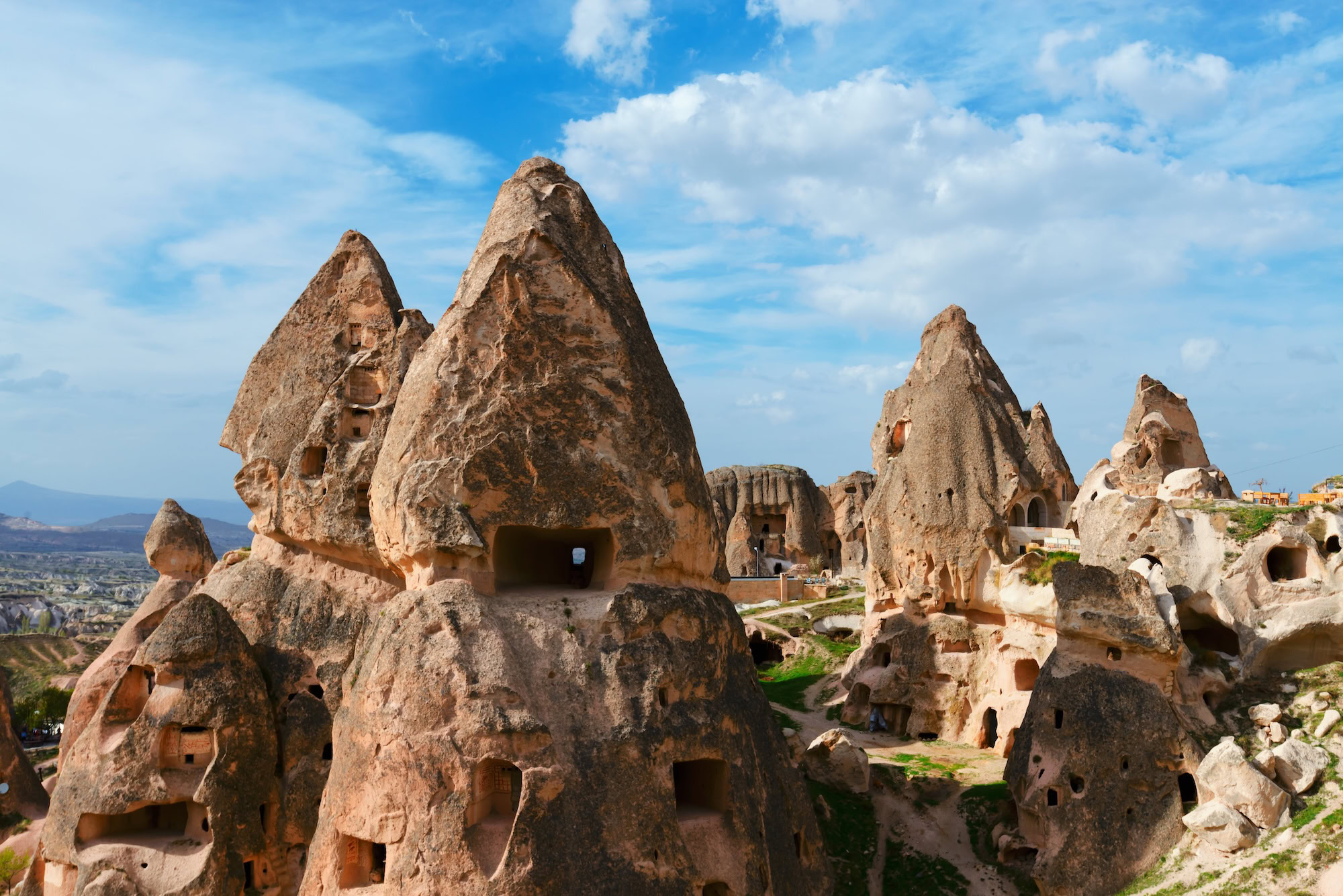 Cappadocia fairy chimneys with carved cave dwellings and stone formations