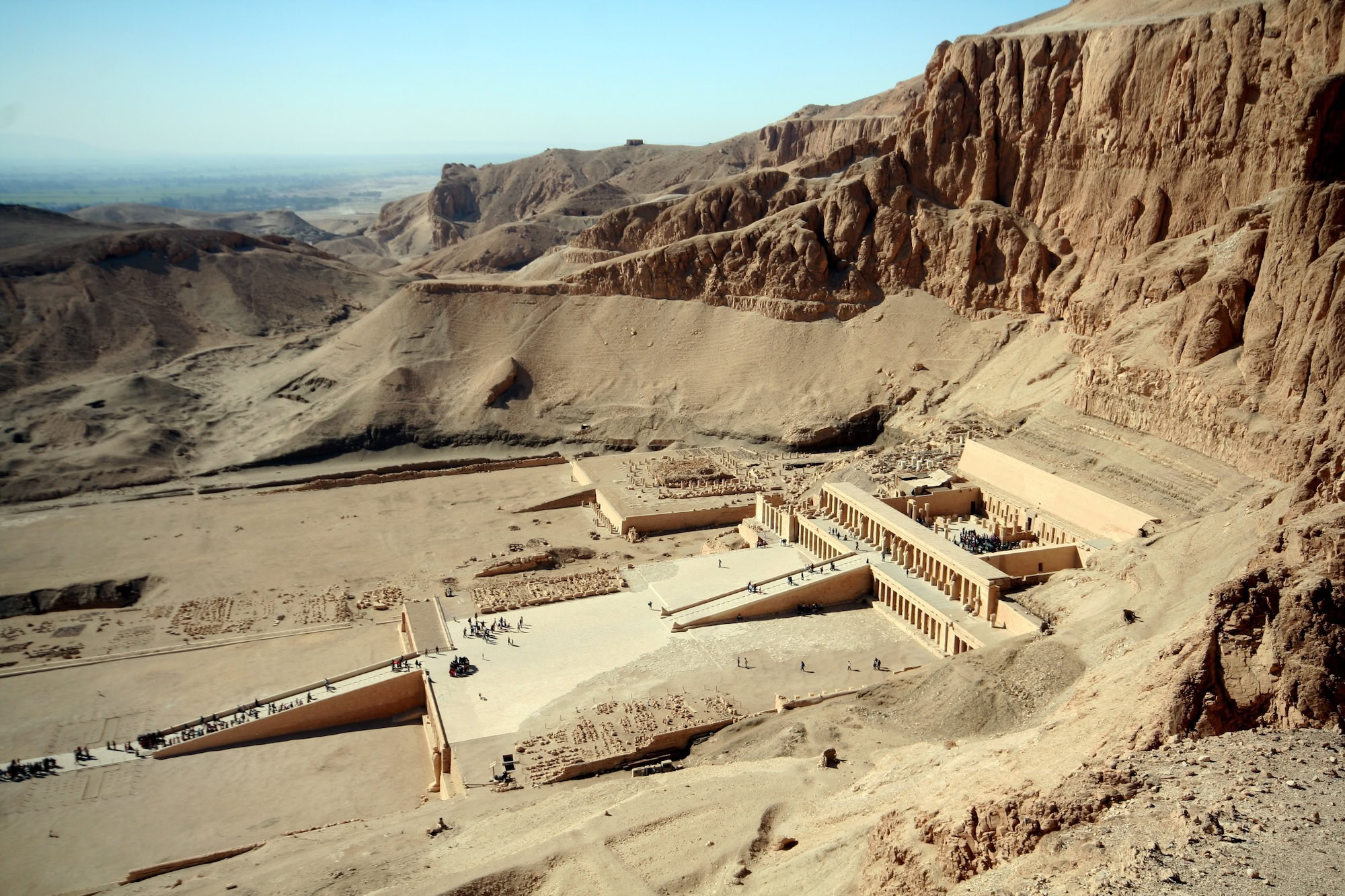 Mortuary Temple of Hatshepsut with terraced architecture against limestone cliffs in Valley of the Kings