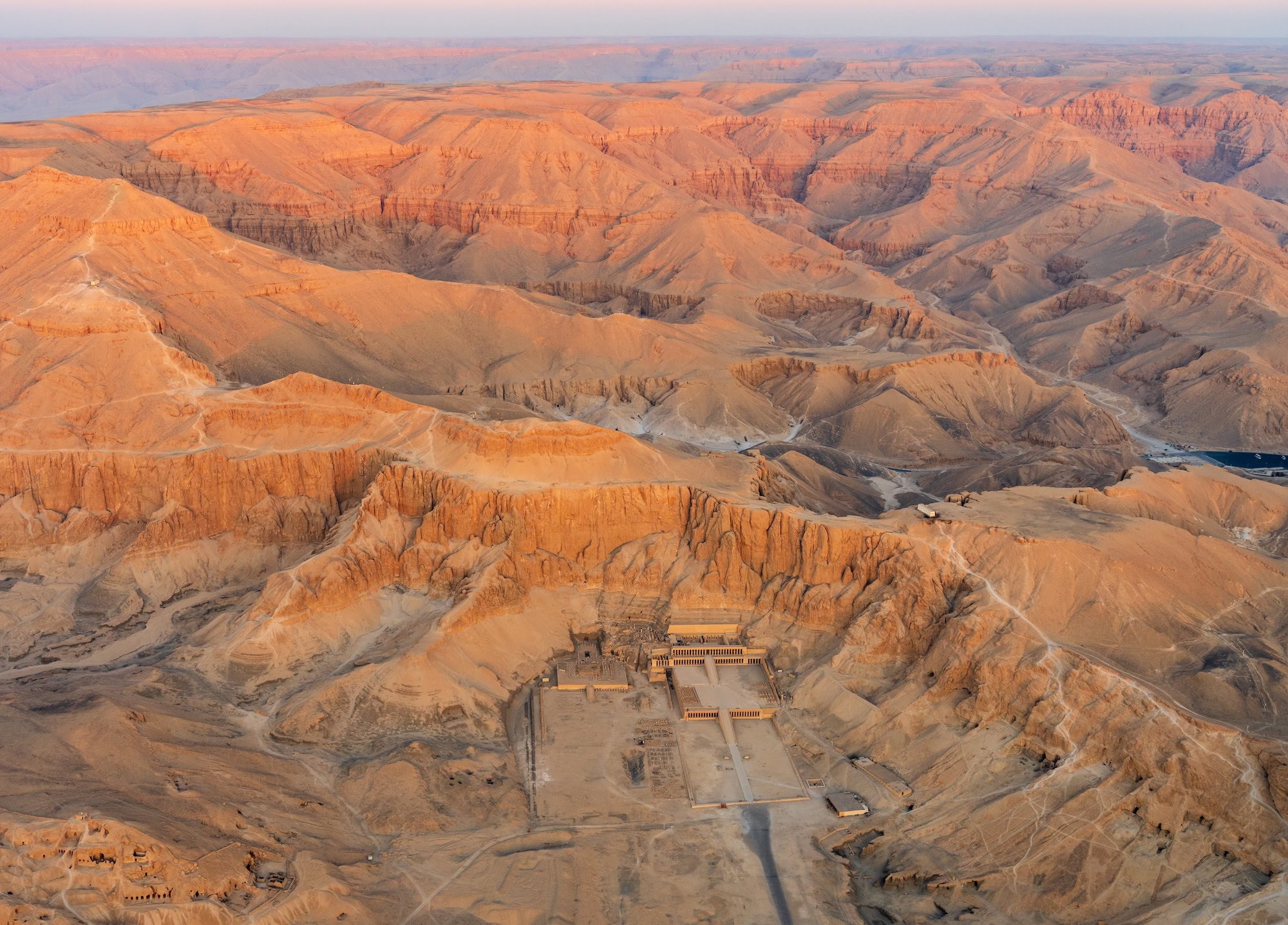 Hatshepsut's mortuary temple carved into limestone cliffs in the Valley of the Kings, Egypt