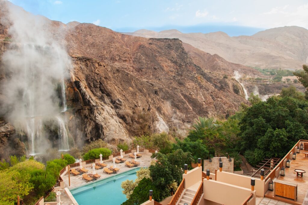 View from the spa hotel to mountain waterfalls with hot water and steam. Main hot springs. Oldest resort in Jordan