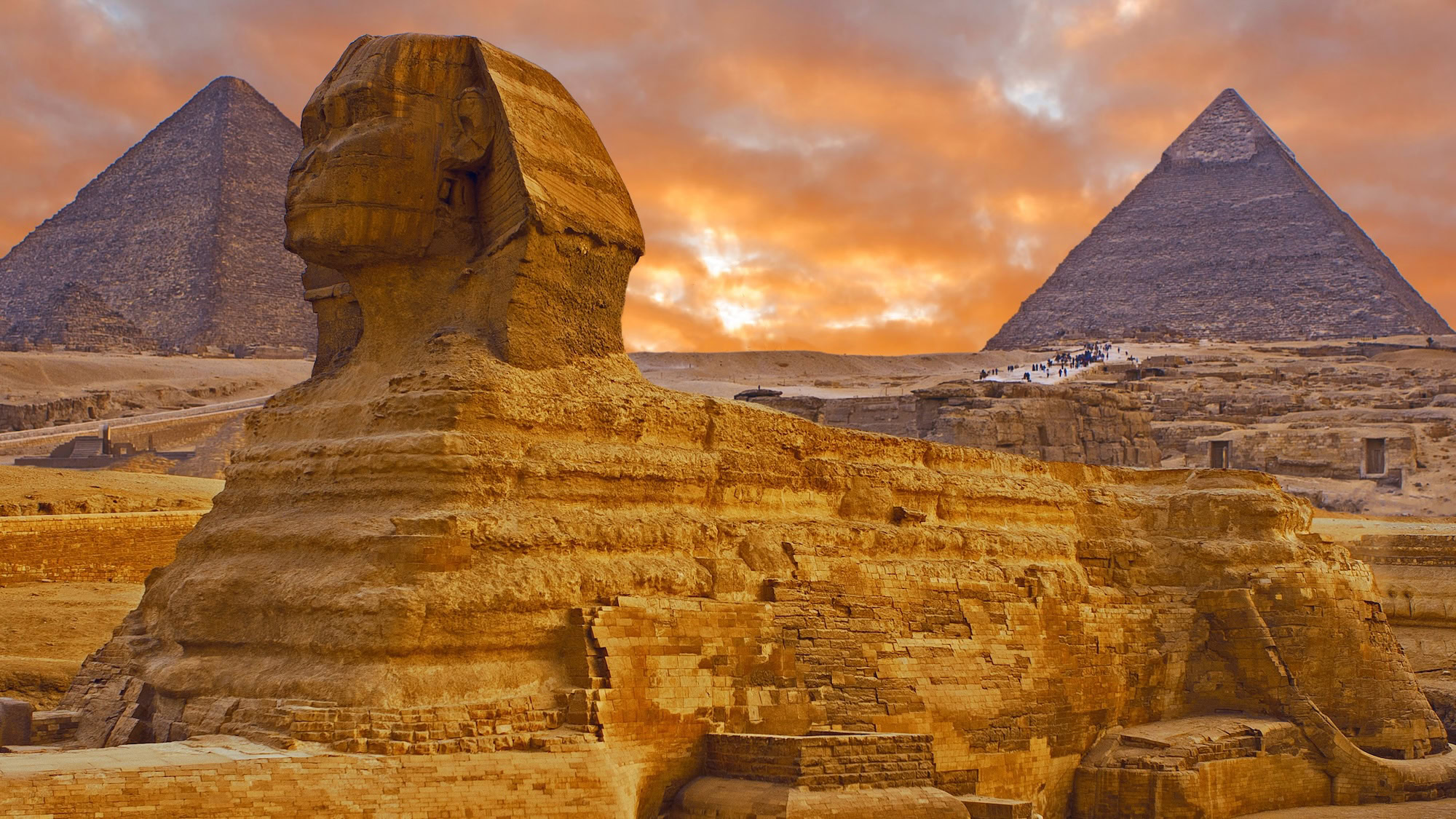 Great Sphinx of Giza with pyramids in the background