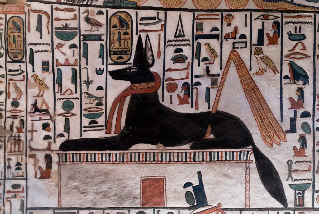 Wall reliefs depicting the god Anubis in the tomb of Queen Nefertari at the Valley of the Queens, Luxor