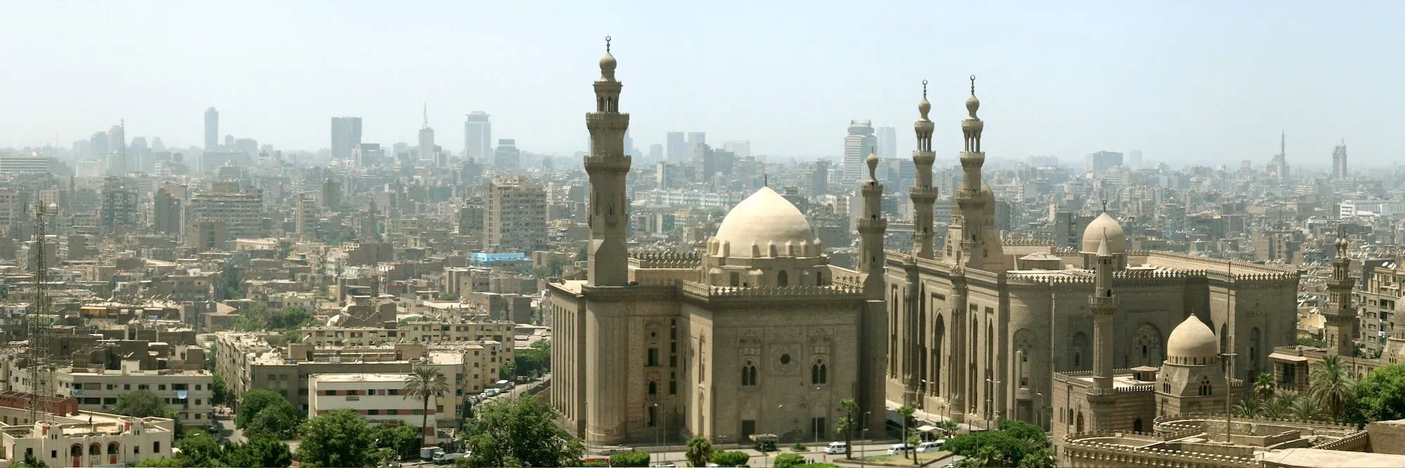 Aerial view of Sultan Hassan Mosque with surrounding mosques and Islamic architecture in Cairo