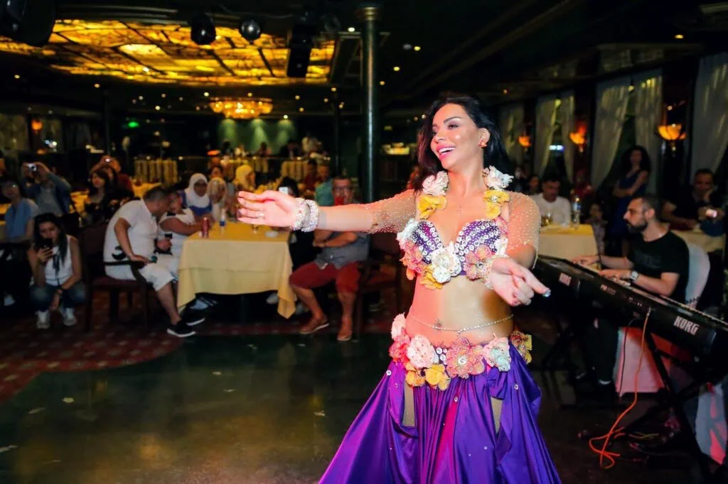 Belly dancing performance on a dinner cruise boat